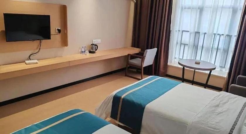 Bed in JTOUR Inn Maoming Gaozhou Guabangling Park