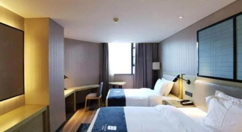 Bed in Echarm Hotel Wuhan Vanke Future Center Wulidun Metro Station