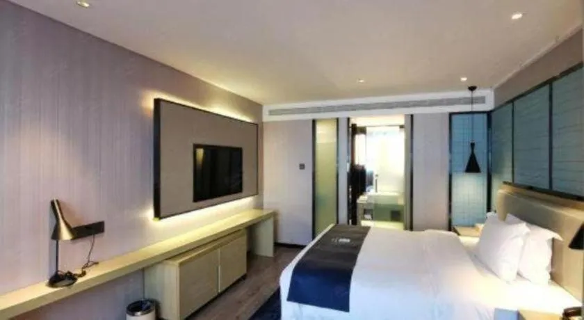 Bed in Echarm Hotel Wuhan Vanke Future Center Wulidun Metro Station