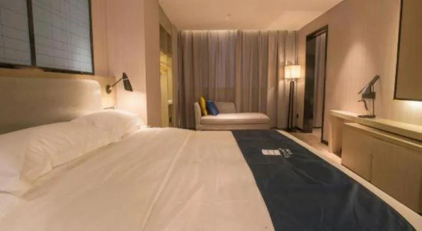 Bed in Echarm Hotel Wuhan Vanke Future Center Wulidun Metro Station