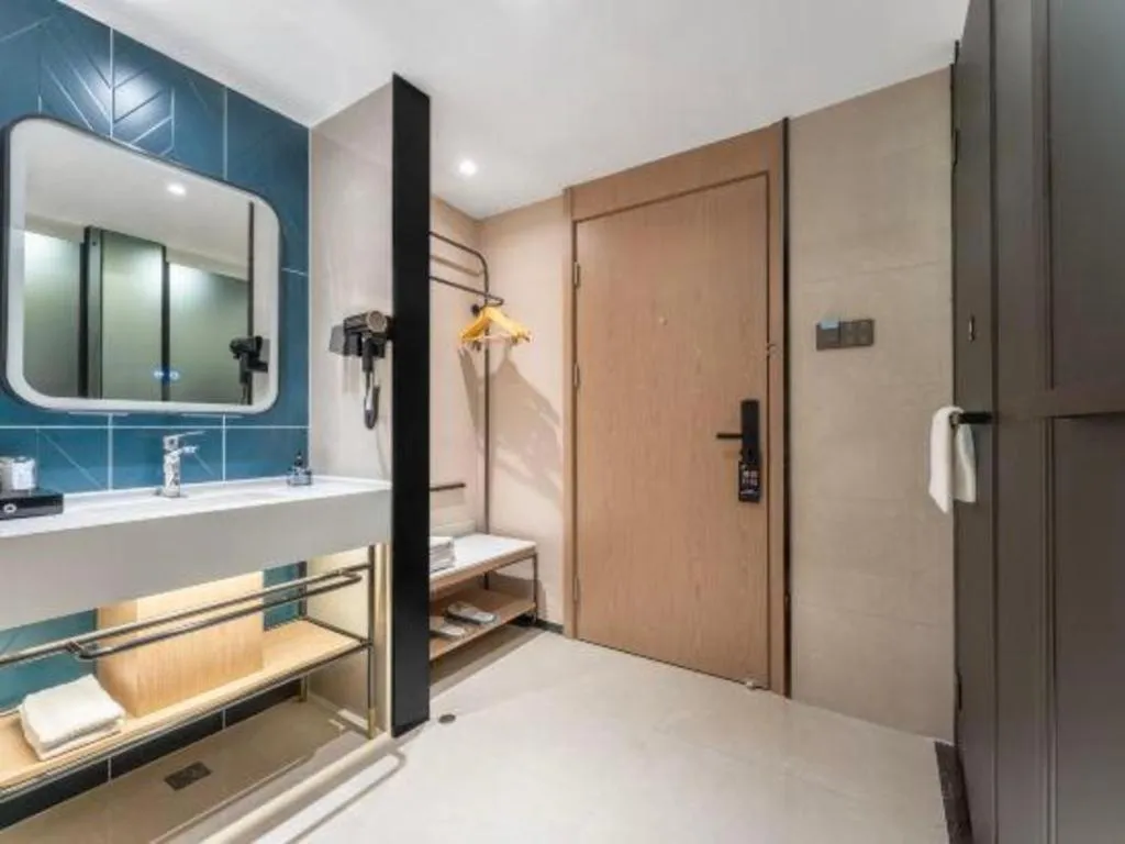 Bed in Echarm Hotel Wuhan Vanke Future Center Wulidun Metro Station