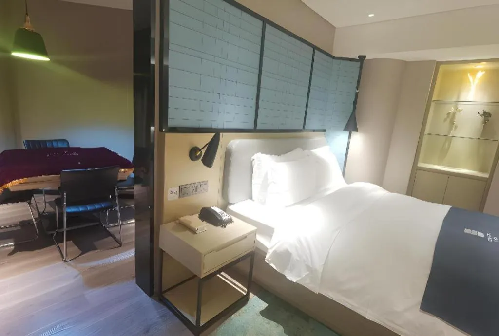 Bed in Echarm Hotel Wuhan Vanke Future Center Wulidun Metro Station