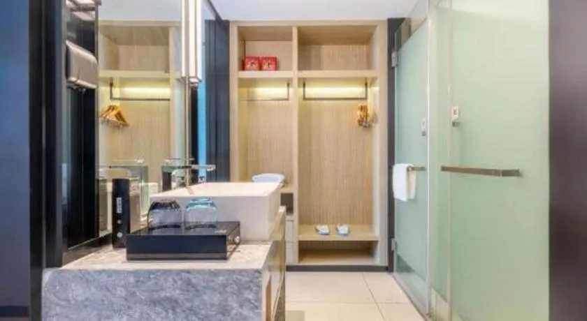 Bed in Echarm Hotel Wuhan Vanke Future Center Wulidun Metro Station