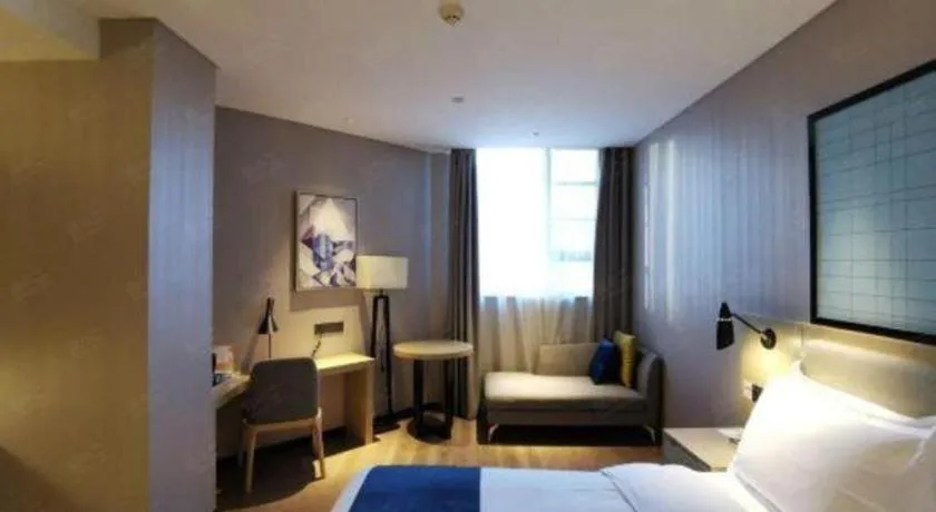 Bed in Echarm Hotel Wuhan Vanke Future Center Wulidun Metro Station