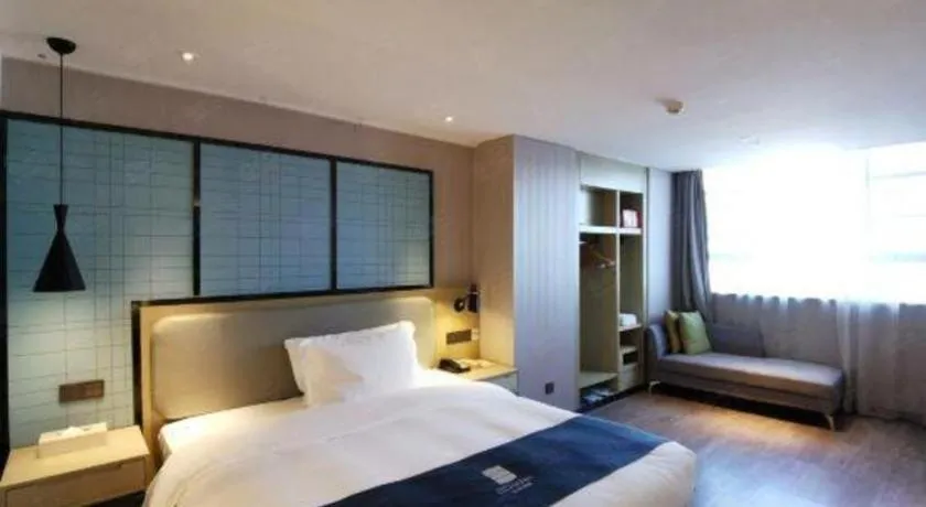 Bed in Echarm Hotel Wuhan Vanke Future Center Wulidun Metro Station