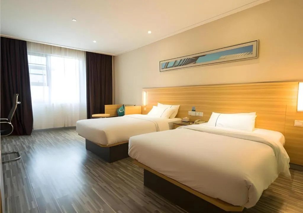 Bed in City Comfort Inn Wuhan East Lake Scenic Area Happy Valley