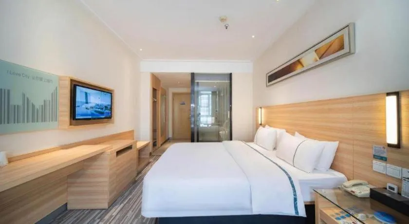 Bed in City Comfort Inn Wuhan East Lake Scenic Area Happy Valley