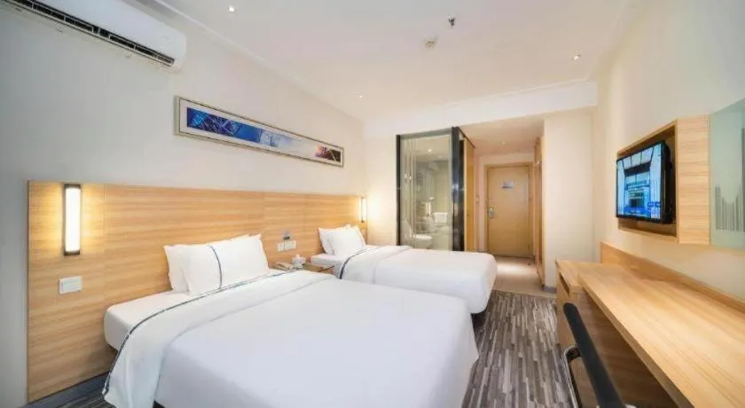 Bed in City Comfort Inn Wuhan East Lake Scenic Area Happy Valley