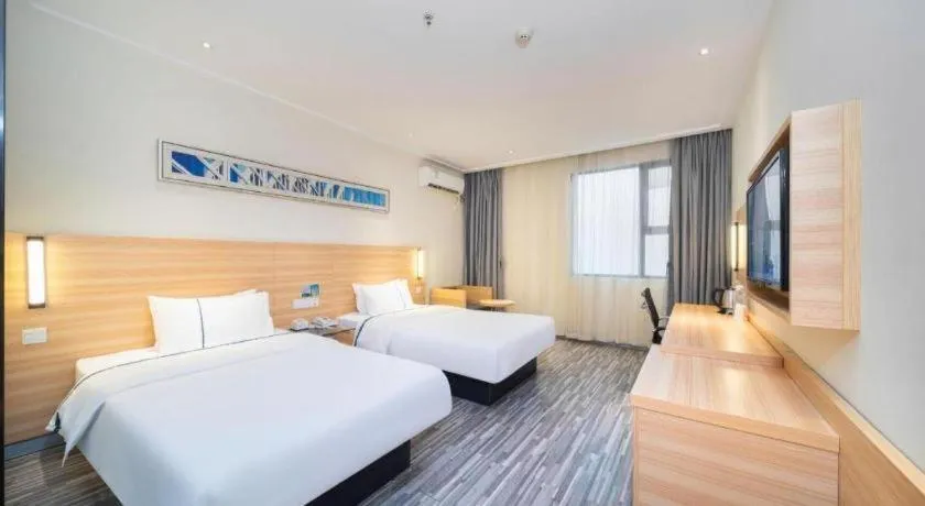 Bed in City Comfort Inn Wuhan East Lake Scenic Area Happy Valley