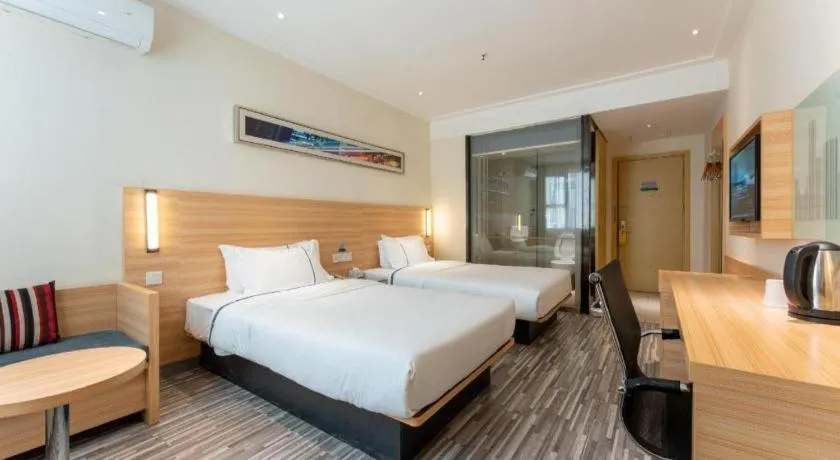 Bed in City Comfort Inn Wuhan East Lake Scenic Area Happy Valley