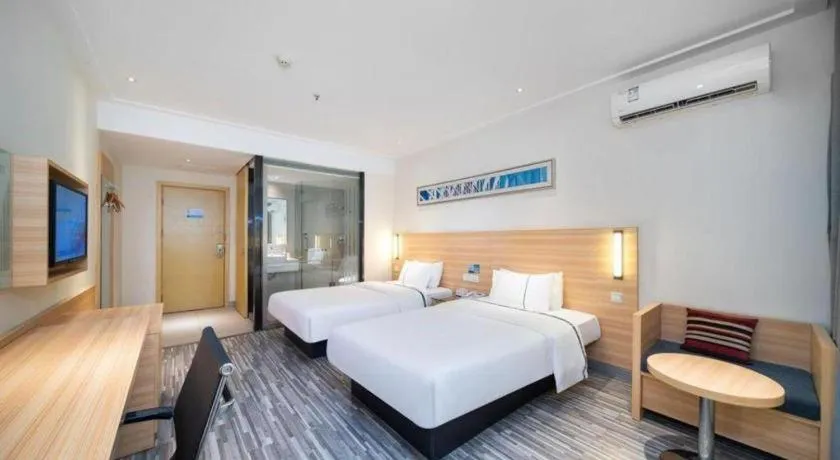 Bed in City Comfort Inn Wuhan East Lake Scenic Area Happy Valley