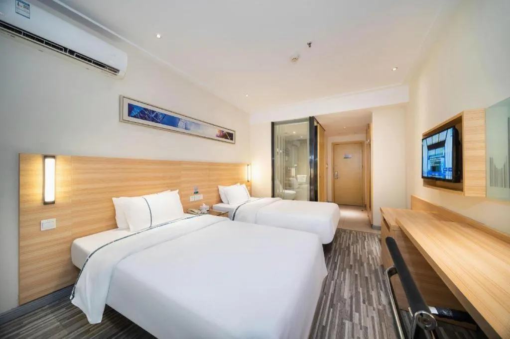 Bed in City Comfort Inn Wuhan East Lake Scenic Area Happy Valley