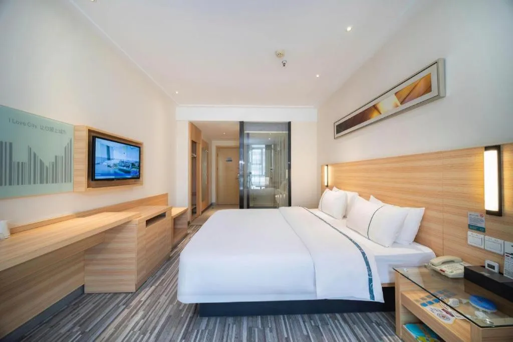 Bed in City Comfort Inn Wuhan East Lake Scenic Area Happy Valley