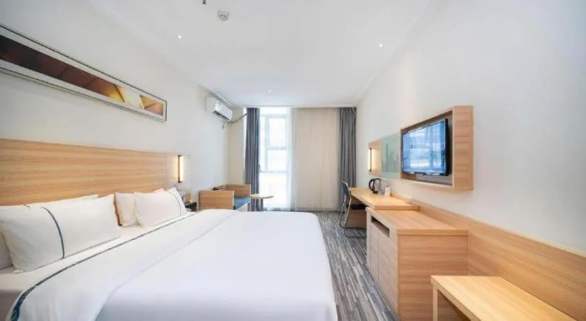 Bed in City Comfort Inn Wuhan East Lake Scenic Area Happy Valley