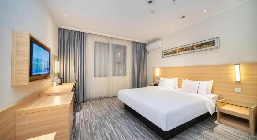 Bed in City Comfort Inn Wuhan East Lake Scenic Area Happy Valley