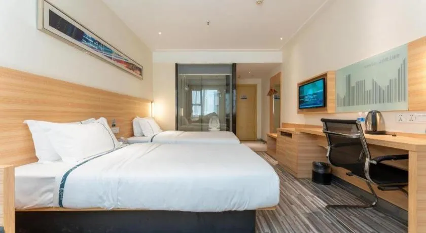 Bed in City Comfort Inn Wuhan East Lake Scenic Area Happy Valley