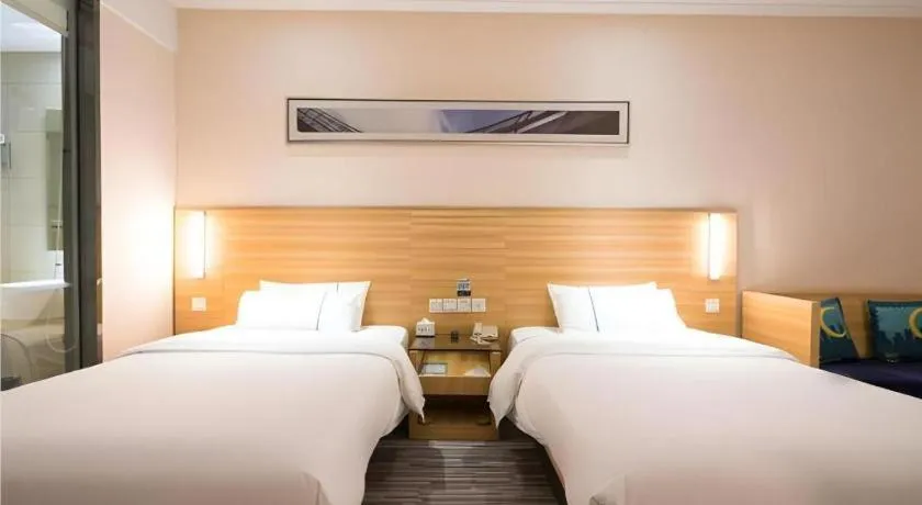 Bed in City Comfort Inn Wuhan East Lake Scenic Area Happy Valley