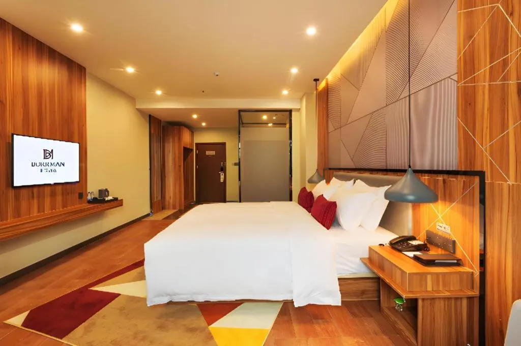 Bed in Borrman Hotel Fangchenggang High-speed Railway North Station Crystal International