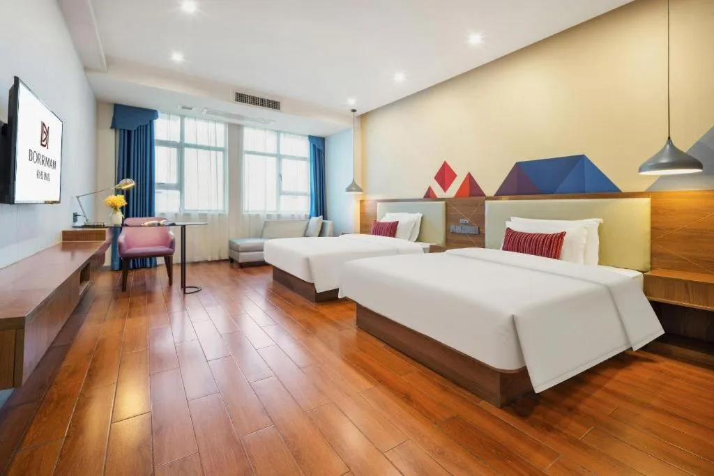 Bed in Borrman Hotel Fangchenggang High-speed Railway North Station Crystal International