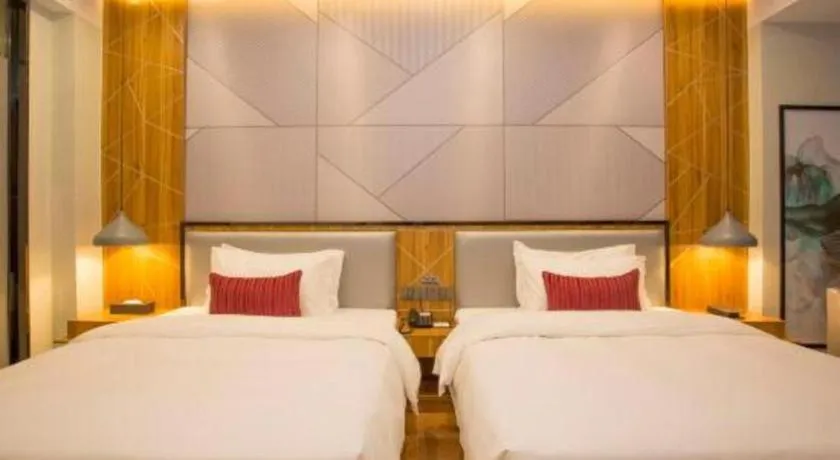 Bed in Borrman Hotel Fangchenggang High-speed Railway North Station Crystal International