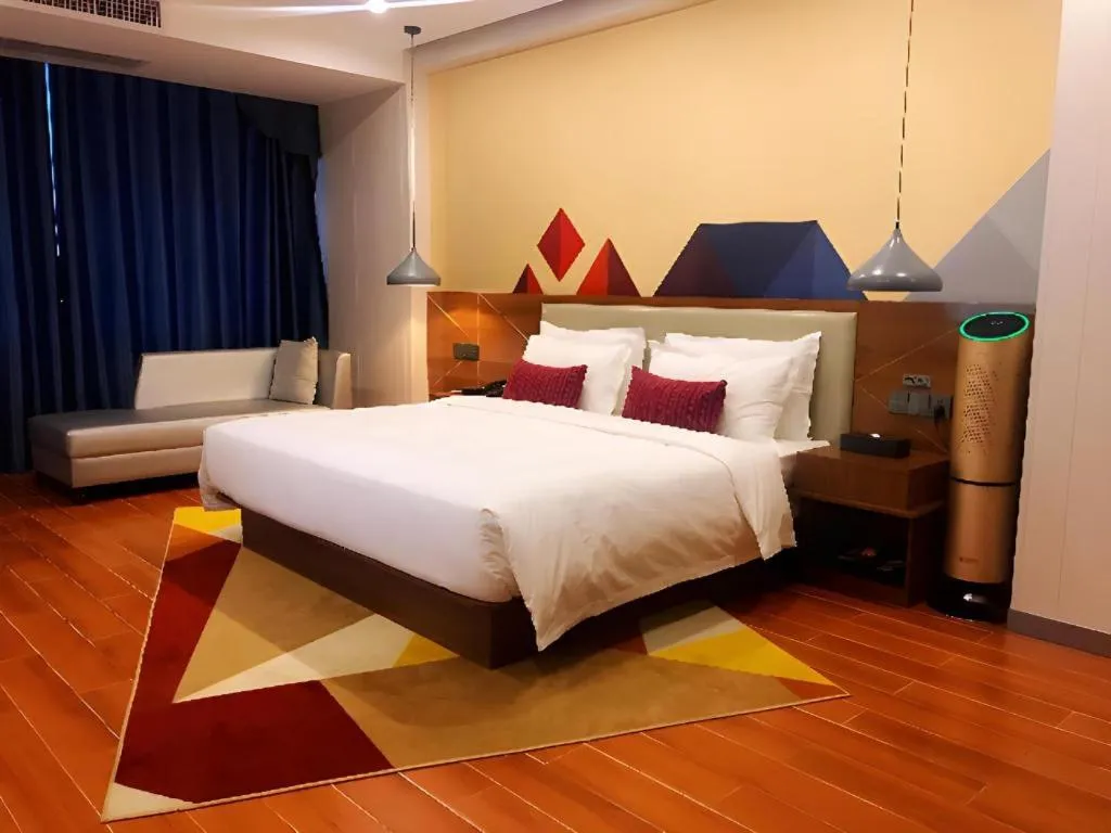 Bed in Borrman Hotel Fangchenggang High-speed Railway North Station Crystal International