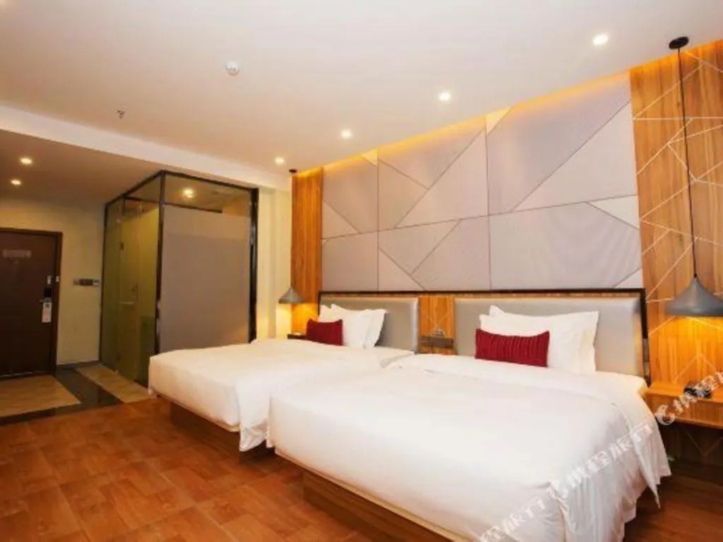 Bed in Borrman Hotel Fangchenggang High-speed Railway North Station Crystal International