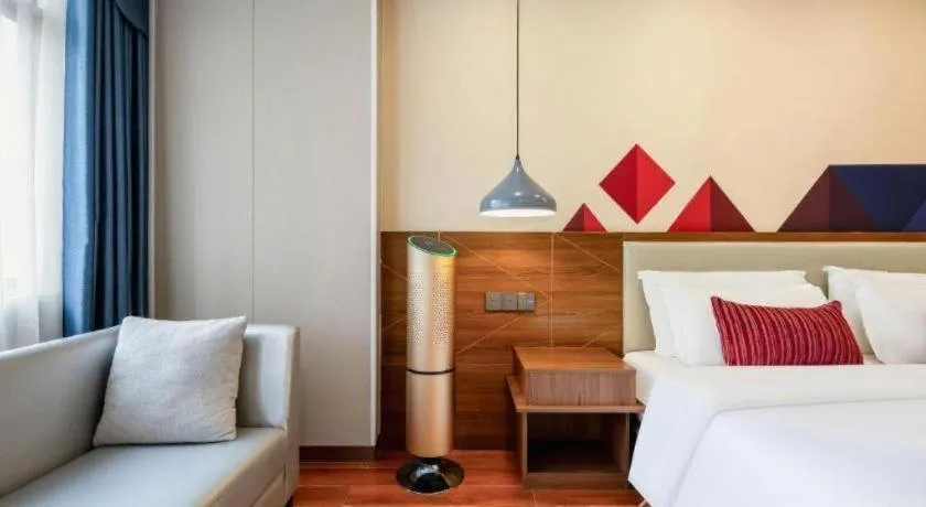 Bed in Borrman Hotel Fangchenggang High-speed Railway North Station Crystal International