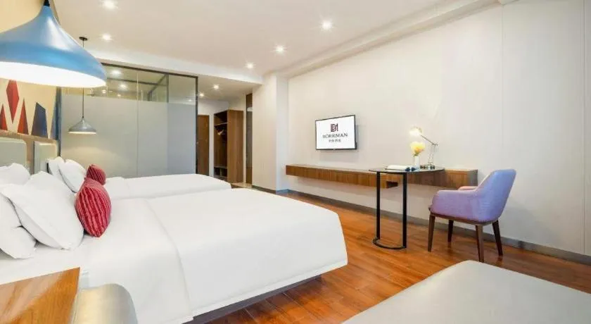 Bed in Borrman Hotel Fangchenggang High-speed Railway North Station Crystal International