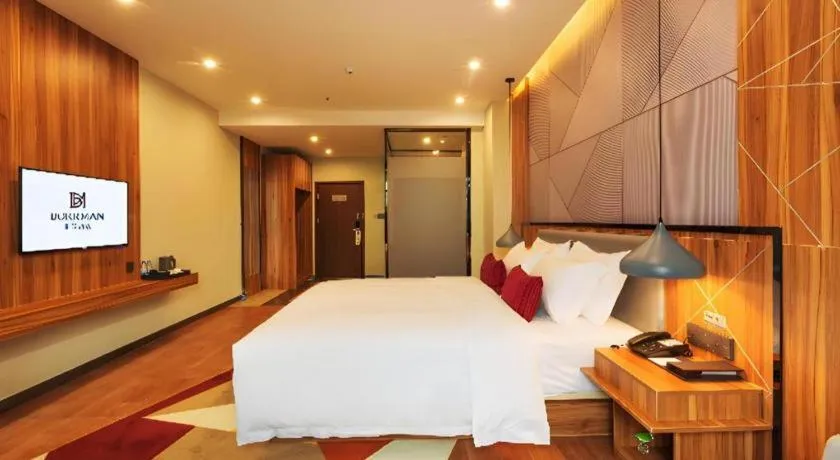 Bed in Borrman Hotel Fangchenggang High-speed Railway North Station Crystal International