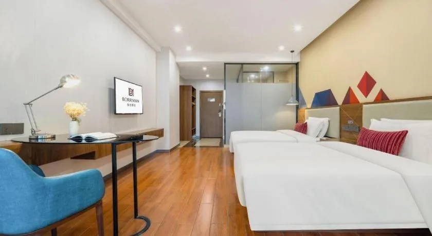 Bed in Borrman Hotel Fangchenggang High-speed Railway North Station Crystal International