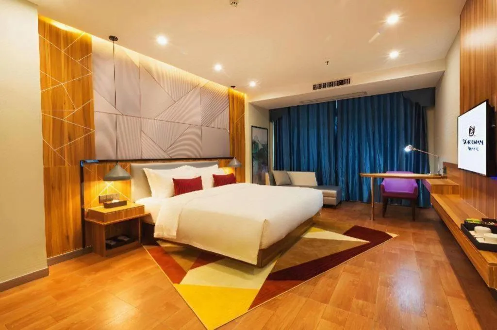 Bed in Borrman Hotel Fangchenggang High-speed Railway North Station Crystal International