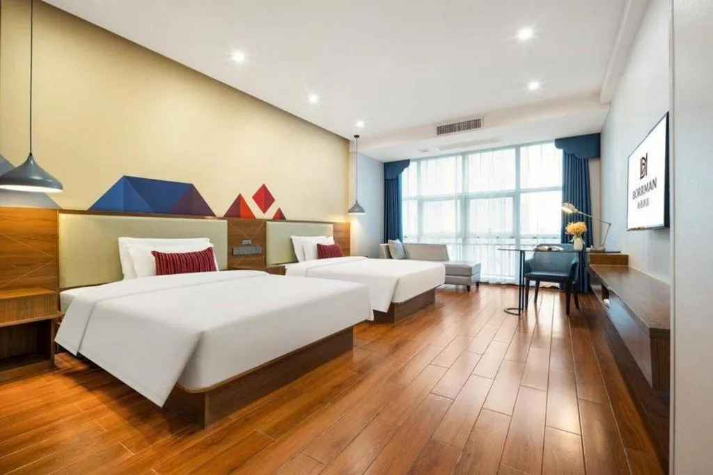 Bed in Borrman Hotel Fangchenggang High-speed Railway North Station Crystal International