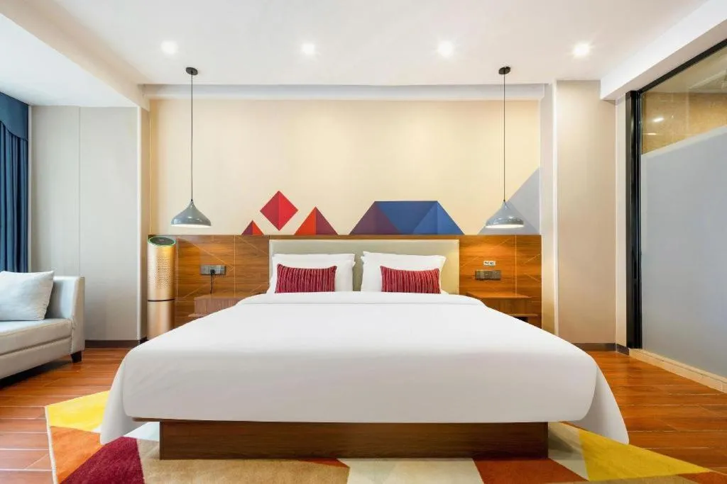 Bed in Borrman Hotel Fangchenggang High-speed Railway North Station Crystal International