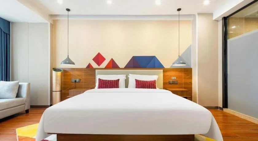 Bed in Borrman Hotel Fangchenggang High-speed Railway North Station Crystal International