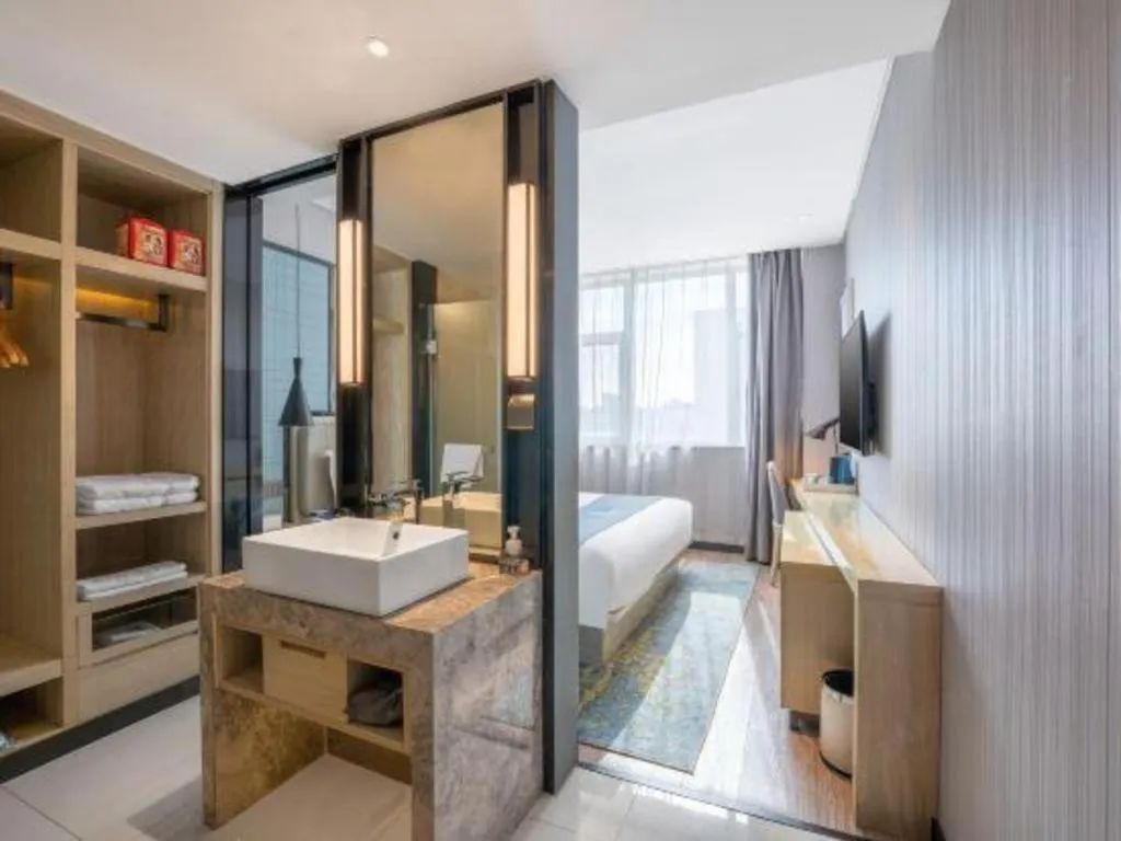 Bed in Echarm Hotel Zibo Gaoqing Zhongcheng Inernational