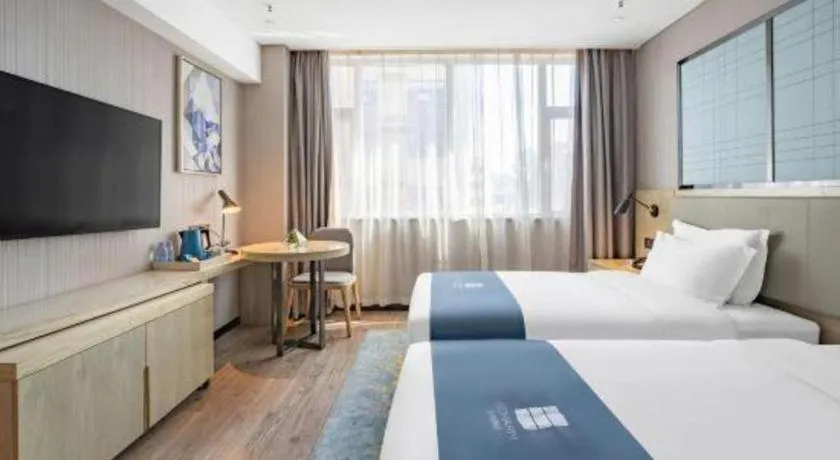 Bed in Echarm Hotel Zibo Gaoqing Zhongcheng Inernational