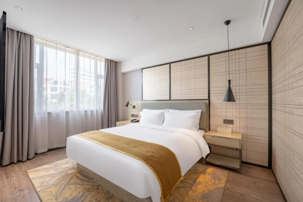 Bed in Echarm Hotel Zibo Gaoqing Zhongcheng Inernational