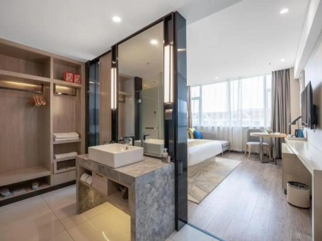 Bed in Echarm Hotel Zibo Gaoqing Zhongcheng Inernational