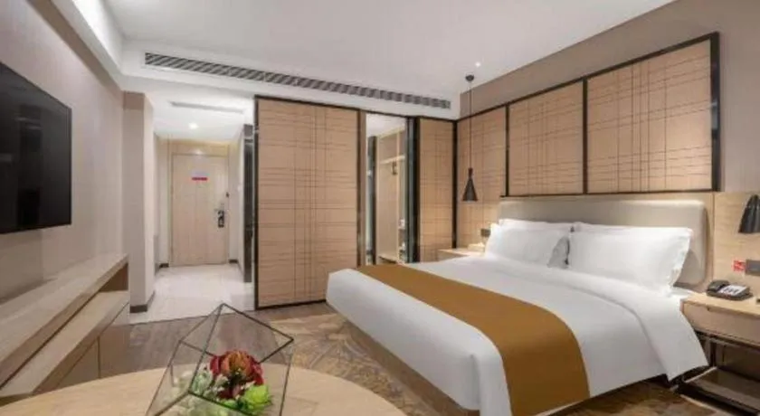 Bed in Echarm Hotel Zibo Gaoqing Zhongcheng Inernational