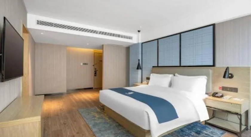 Bed in Echarm Hotel Zibo Gaoqing Zhongcheng Inernational