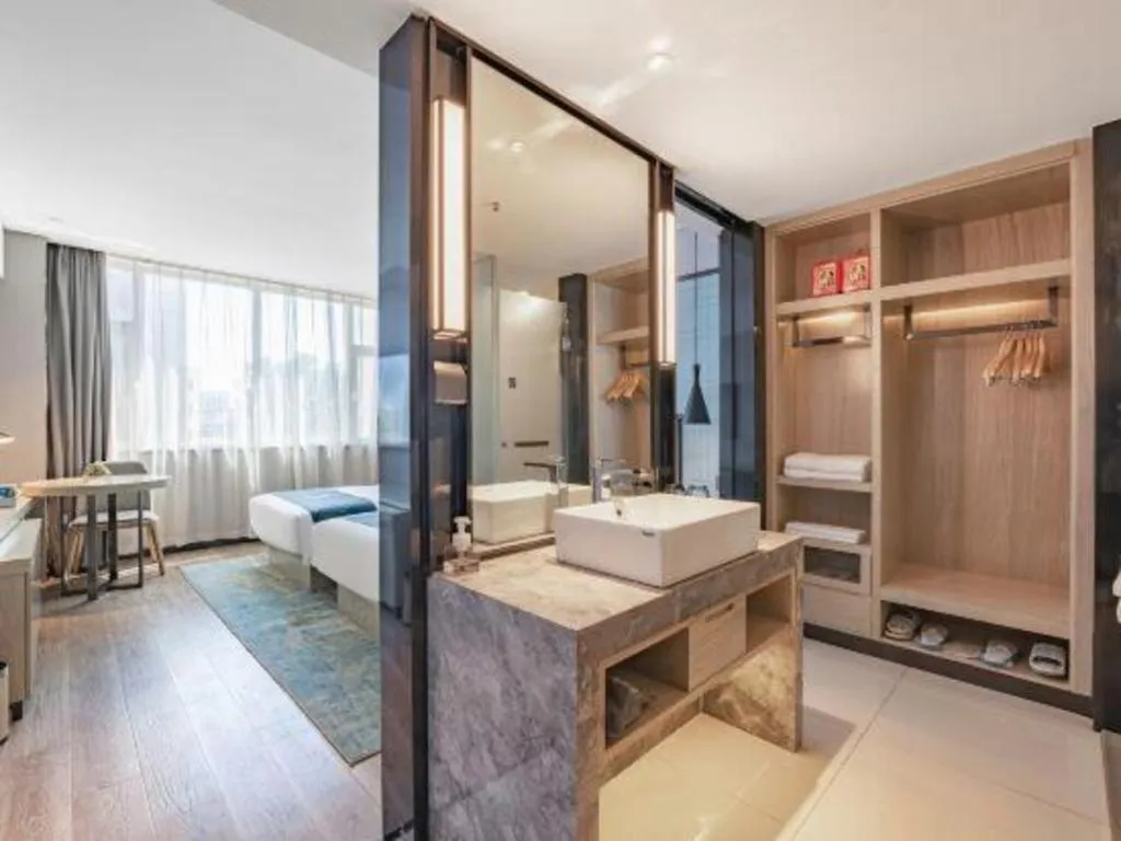 Bed in Echarm Hotel Zibo Gaoqing Zhongcheng Inernational