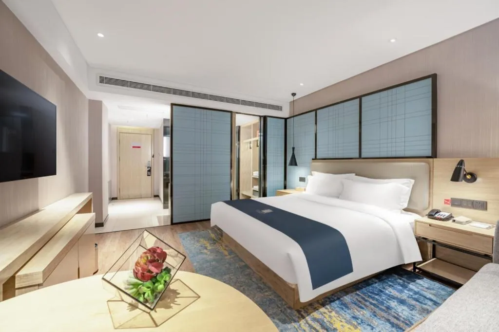 Bed in Echarm Hotel Zibo Gaoqing Zhongcheng Inernational