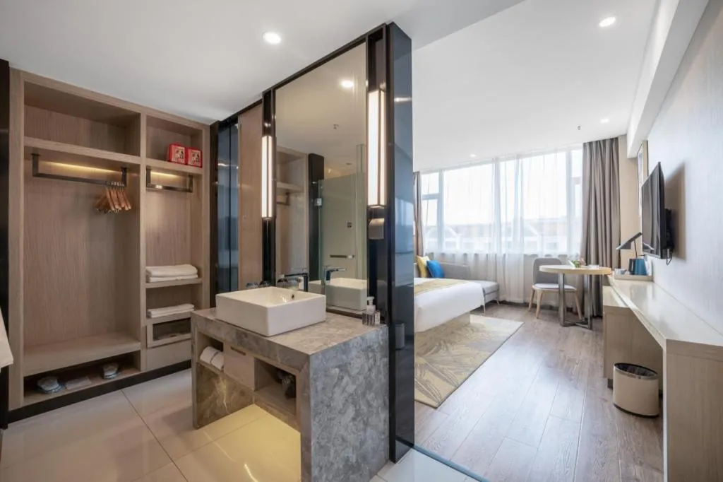 Bed in Echarm Hotel Zibo Gaoqing Zhongcheng Inernational