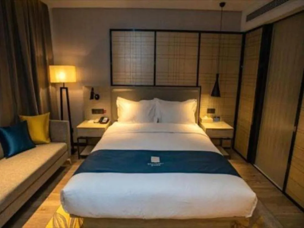 Bed in Echarm Hotel Zibo Gaoqing Zhongcheng Inernational