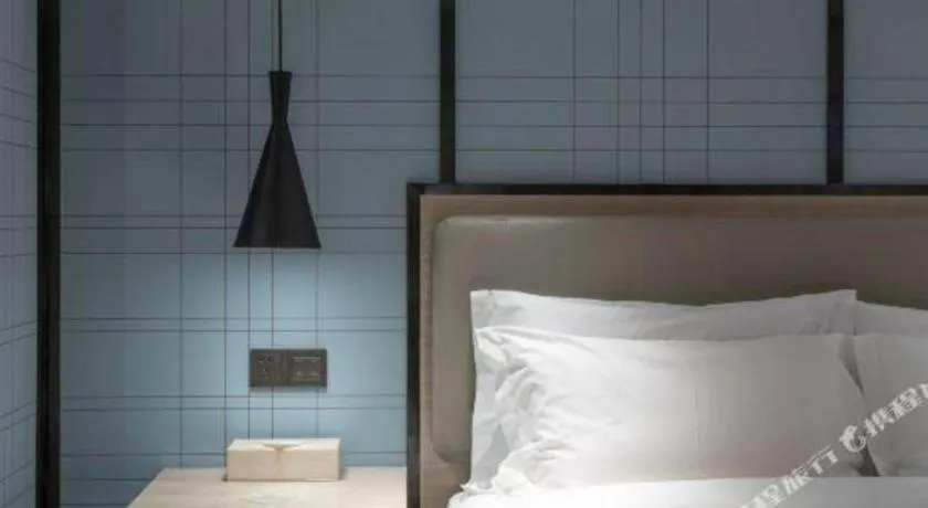 Bed in Echarm Hotel Zibo Gaoqing Zhongcheng Inernational