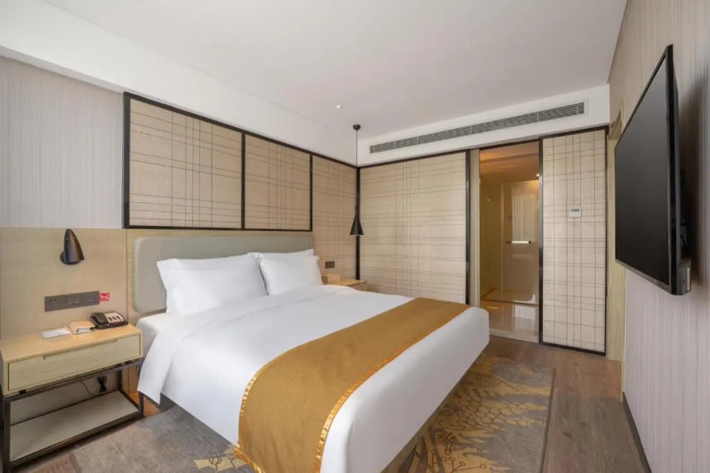 Bed in Echarm Hotel Zibo Gaoqing Zhongcheng Inernational