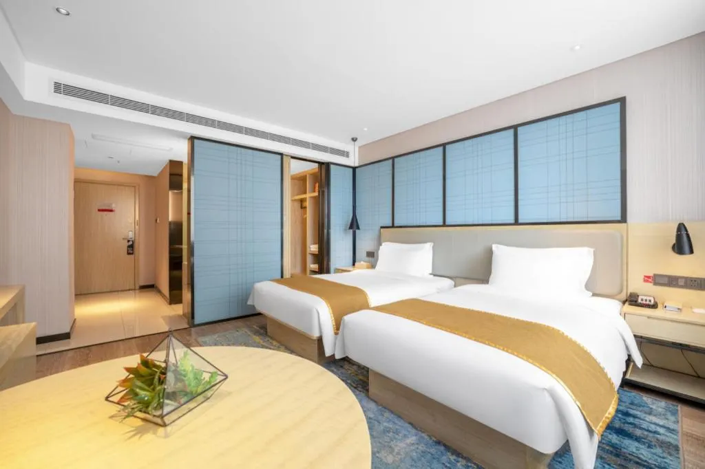 Bed in Echarm Hotel Zibo Gaoqing Zhongcheng Inernational