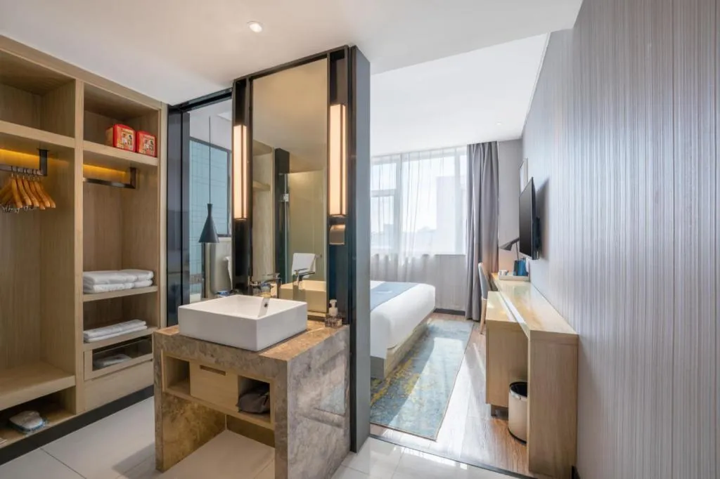 Bed in Echarm Hotel Zibo Gaoqing Zhongcheng Inernational