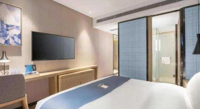 Bed in Echarm Hotel Zibo Gaoqing Zhongcheng Inernational