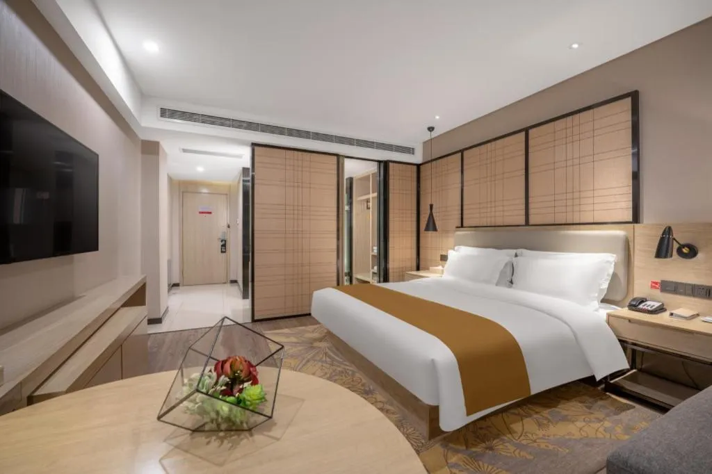 Bed in Echarm Hotel Zibo Gaoqing Zhongcheng Inernational
